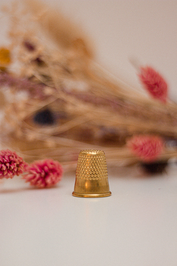 Dé de couture laiton or maunamé